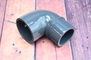 PVC Winkel 90° reduziert, Klebestutzen x Klebemuffe 40/50mm x 50mm PN16